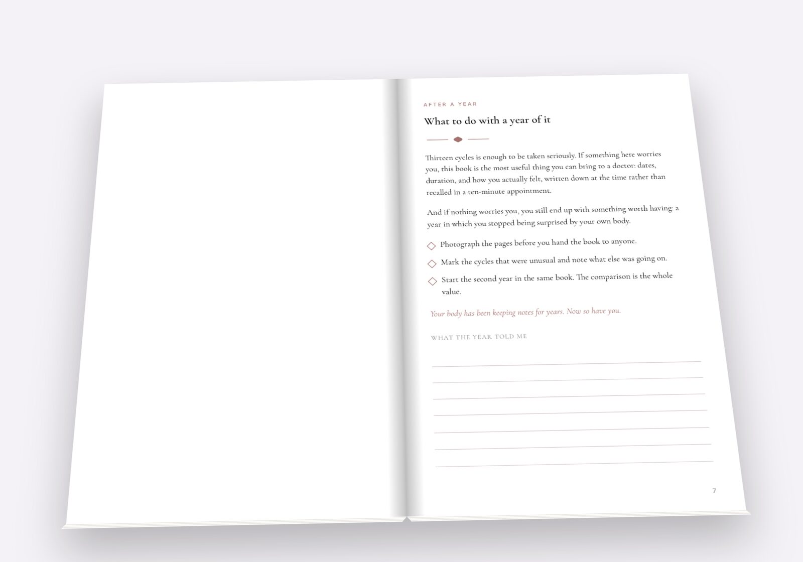 The Cycle Journal lying open, showing a spread of the pages you fill in