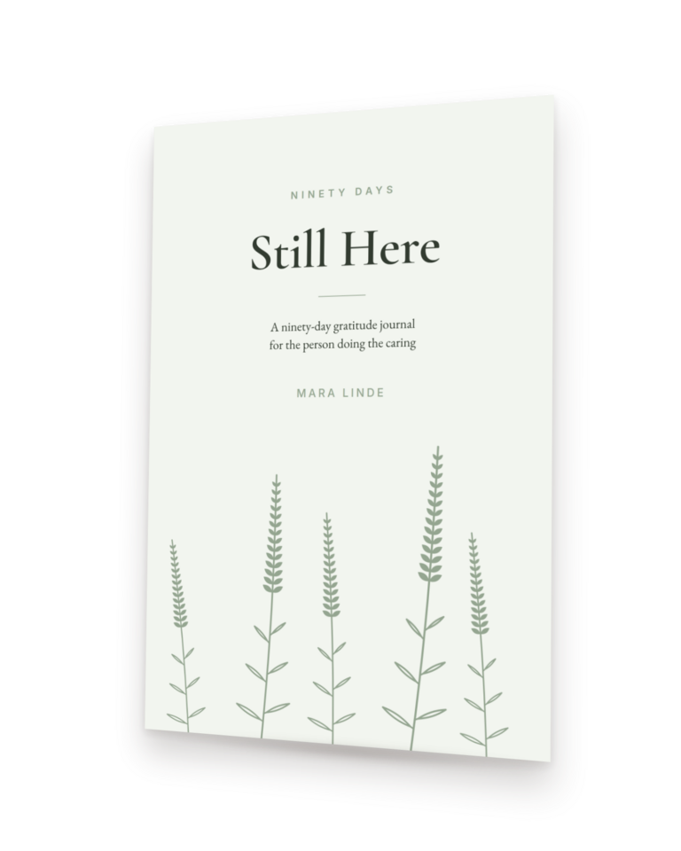 Still Here by Mara Linde, shown as a paperback standing at an angle