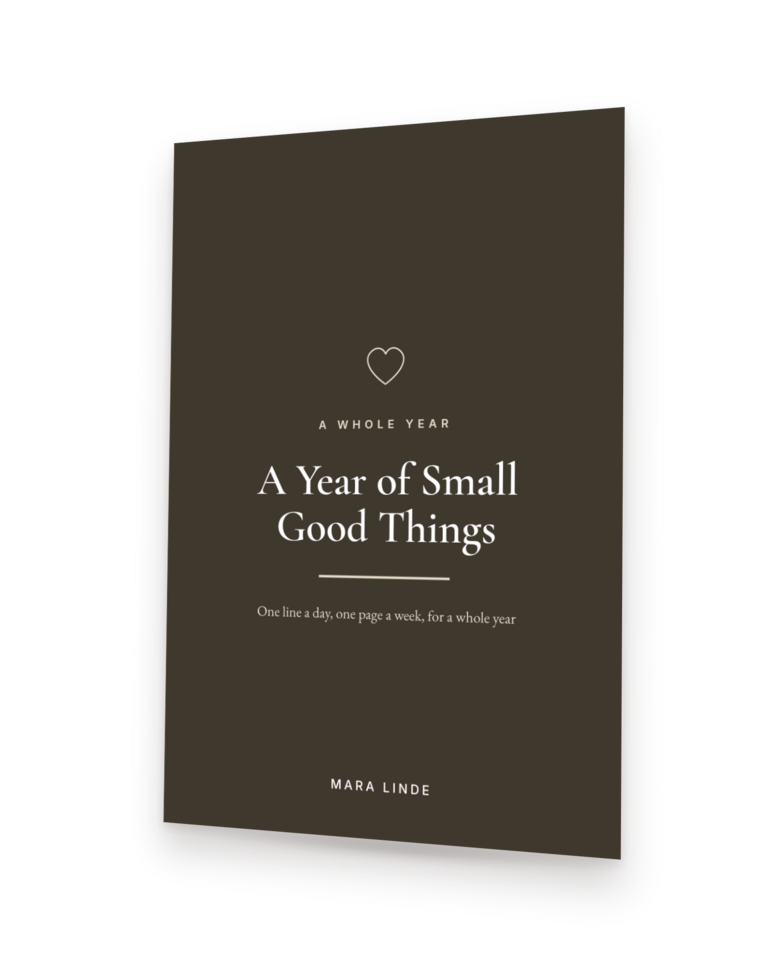 A Year of Small Good Things by Mara Linde, shown as a paperback standing at an angle