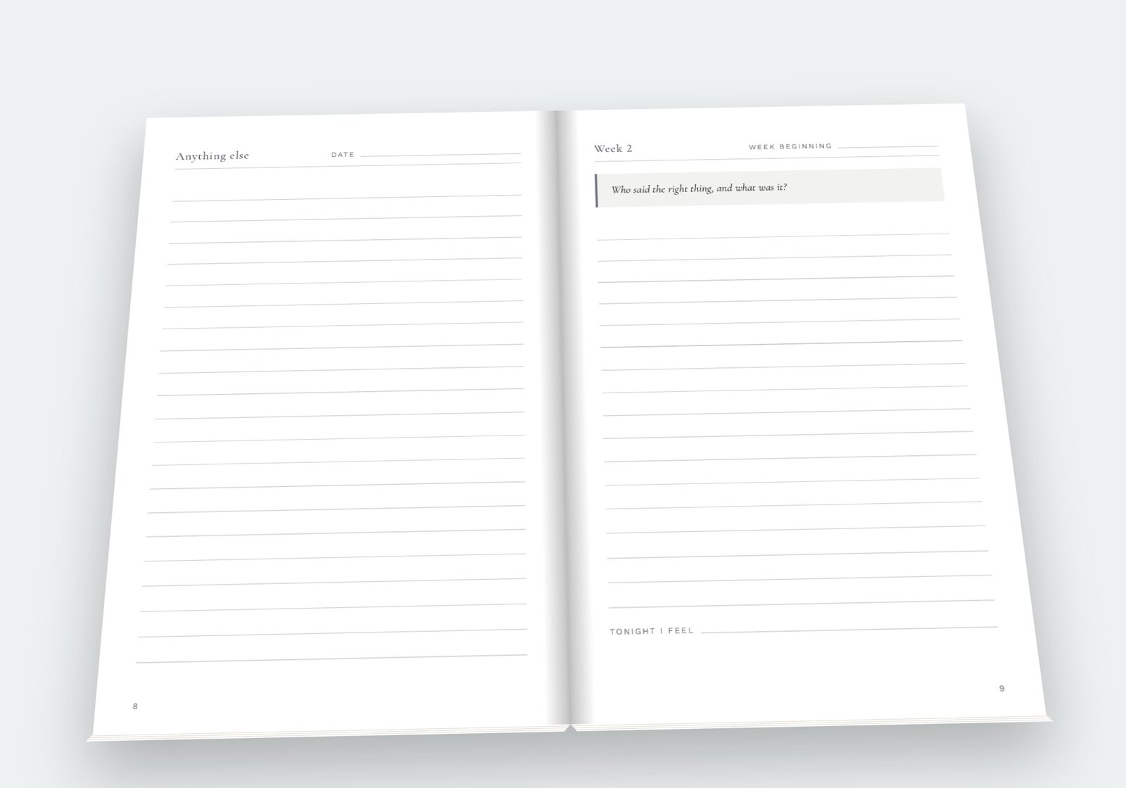 The Year After lying open on a table, showing a spread of the pages you fill in